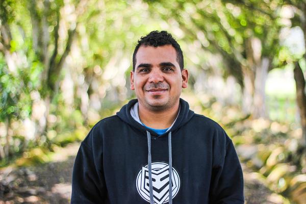 Man in jumper smiling